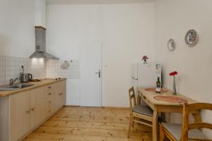 Kuchyň nebo kuchyňský kout v ubytování Apartmán 3, Suvorovova 158