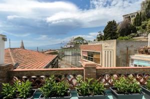 a view from the roof of a building at Sweet Taormina Apartment in Taormina