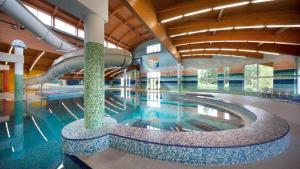 Bazén v ubytování LIPNO WELLNESS - FRYMBURK C112 private family room nebo v jeho okolí