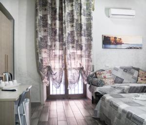 Area tempat duduk di B&B VIVA NAPOLI