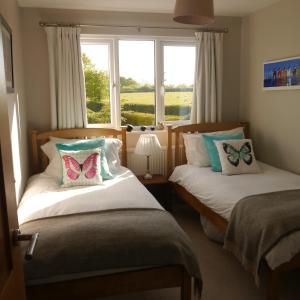 เตียงในห้องที่ Appletrees B&B