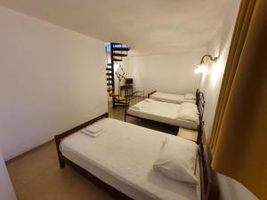 Posteľ alebo postele v izbe v ubytovaní Sahas Apartments