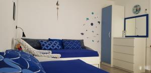 Posteľ alebo postele v izbe v ubytovaní Apartmani Balažić