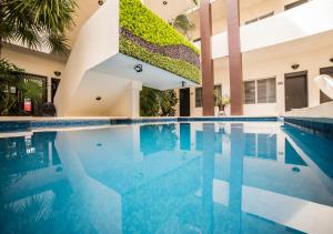 Bazén v ubytování Hotel Marlon nebo v jeho okolí + 27 fotografií