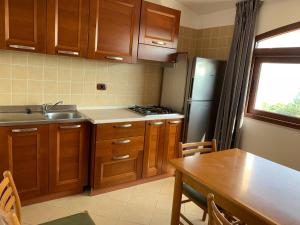 Kuchyň nebo kuchyňský kout v ubytování Villaggio Idra