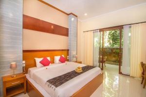 Adi Jaya Cottages Ubud Suites by EPS - CHSE Certified 객실 침대