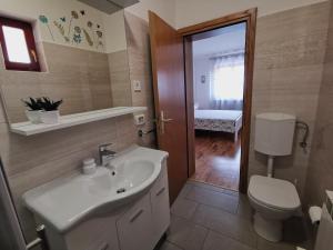 Kúpeľňa v ubytovaní Apartment Mita