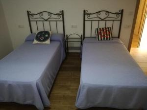 Posteľ alebo postele v izbe v ubytovaní Casa Xestadelo