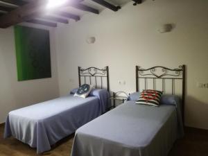 Posteľ alebo postele v izbe v ubytovaní Casa Xestadelo