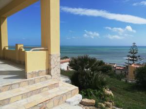 a view of the ocean from a house at Villa Fiorella in Sciacca