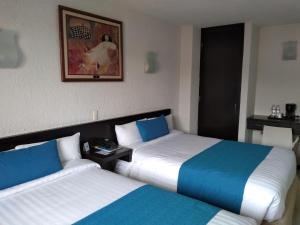 Letto o letti in una camera di Hotel Ros Gaud