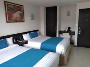 Letto o letti in una camera di Hotel Ros Gaud