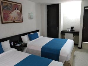 Letto o letti in una camera di Hotel Ros Gaud