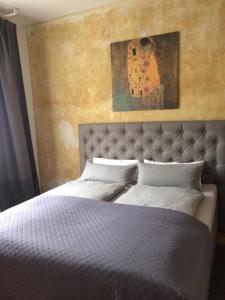 En eller flere senge i et værelse på Apartment Troisdorf - Bonn