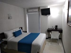 Letto o letti in una camera di Hotel Ros Gaud