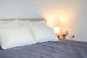 Postel nebo postele na pokoji v ubytování Apartmani Matko