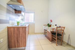 Kuchyň nebo kuchyňský kout v ubytování Apartmani Matko
