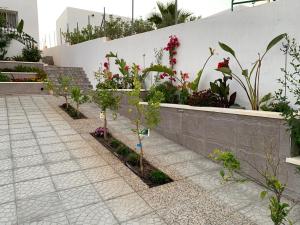Zahrada ubytování Maison Alriad - Alojamiento familiar tranquilo cerca del mar con jardín, porche y parking privado en el interior de la finca no apto para fiestas