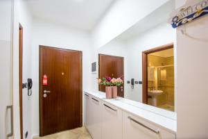 Koupelna v ubytování Apartment Studio Premier + 29 fotografií