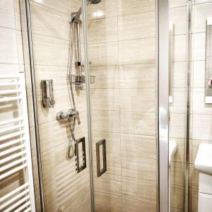 Kúpeľňa v ubytovaní CENTRAL Marienbad Apartaments + 37 fotografií