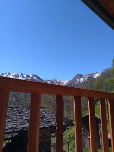 a view of the mountains from the deck of a cabin at Meiro di Choco in Pradleves