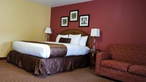 Ένα ή περισσότερα κρεβάτια σε δωμάτιο στο Forks Motel
