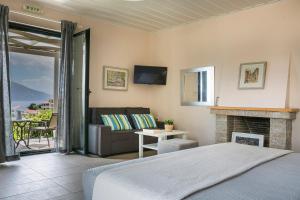 Postel nebo postele na pokoji v ubytování Martini Waterfront Suites