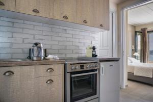 Kuchyň nebo kuchyňský kout v ubytování Martini Waterfront Suites