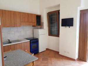 Køkken eller tekøkken på stupenda casetta in centro storico + 8 billeder