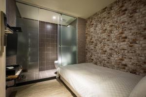 A bed or beds in a room at The Cole Hotel