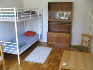 Двухъярусная кровать или двухъярусные кровати в номере Stenslid Bottna By St Anna