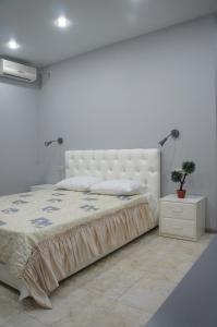 Krevet ili kreveti u jedinici u objektu Guest House Volgograd