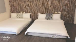 Giường trong phòng chung tại Redbean Guesthouse