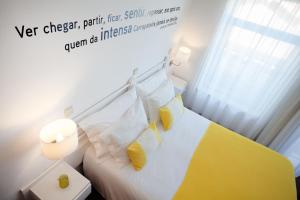 Кровать или кровати в номере Hotel Alcatruz