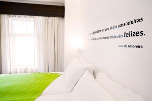 Кровать или кровати в номере Hotel Alcatruz