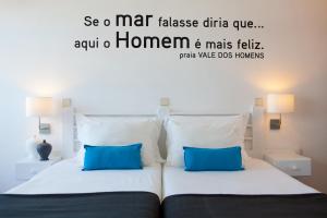 Кровать или кровати в номере Hotel Alcatruz