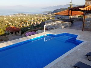 Бассейн в Rathimata Villas или поблизости