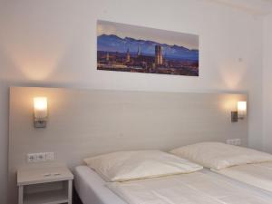Postel nebo postele na pokoji v ubytování Hotel Olympia