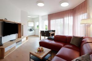 Area tempat duduk di Cool Šilo Appartement Resort