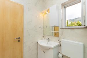 Koupelna v ubytování Apartments Vesna + 37 fotografií