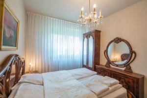 Posteľ alebo postele v izbe v ubytovaní Royal Luxus Wellness Apartman