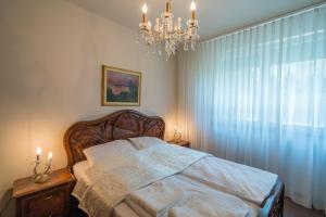 Posteľ alebo postele v izbe v ubytovaní Royal Luxus Wellness Apartman