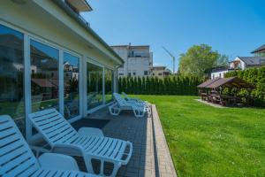 Vonkajšia záhrada v ubytovaní Royal Luxus Wellness Apartman