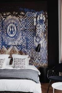 Postel nebo postele na pokoji v ubytování La Villa Guy & Spa - Teritoria