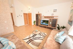 Posedenie v ubytovaní Luxury penthouse with jacuzzi in Orebić (Dalmatia)