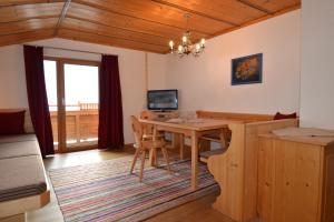 TV a/nebo společenská místnost v ubytování Ferienhaus Rieder