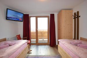 Postel nebo postele na pokoji v ubytování Ferienhaus Rieder