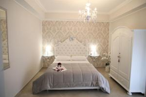 Postel nebo postele na pokoji v ubytování B&B Pompei Olympus