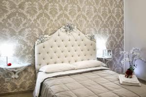 Postel nebo postele na pokoji v ubytování B&B Pompei Olympus