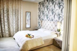 Postel nebo postele na pokoji v ubytování B&B Pompei Olympus